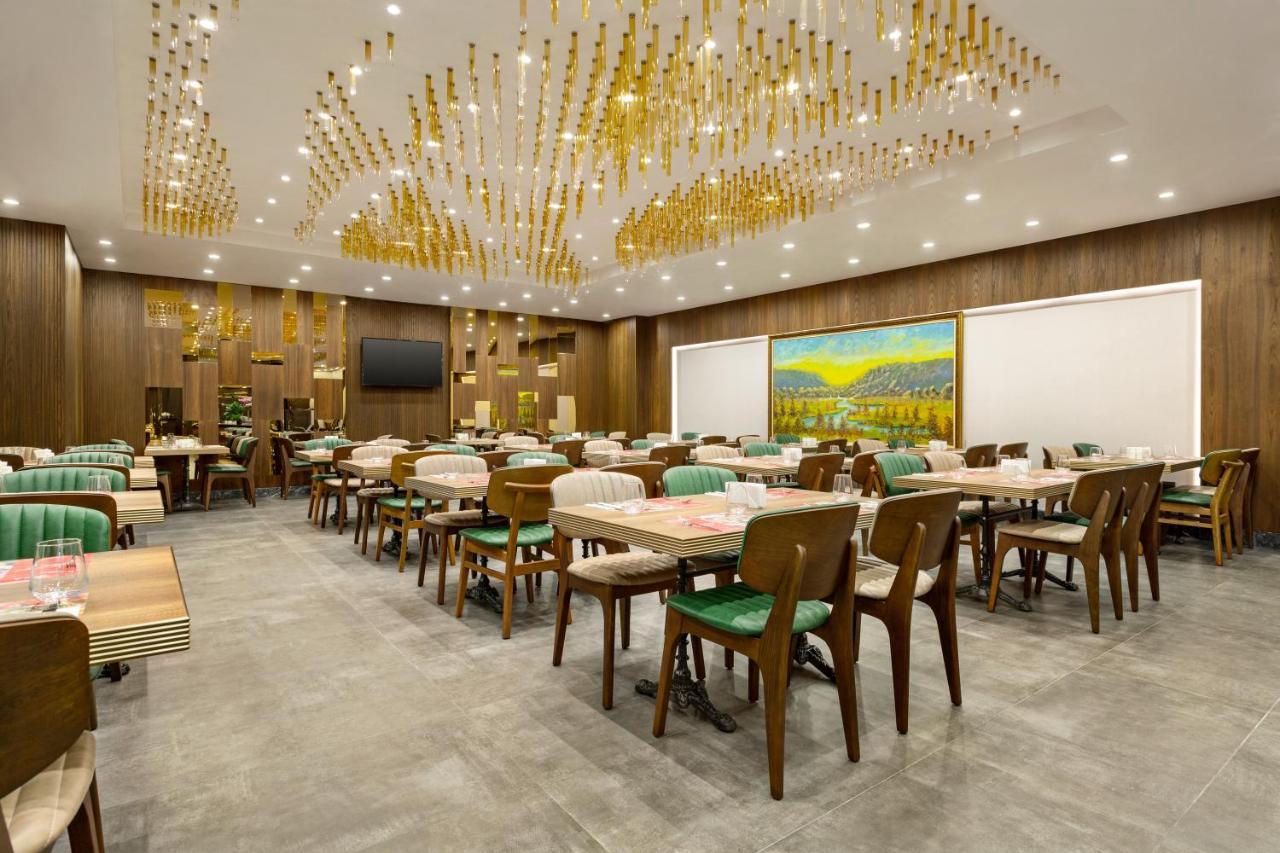 Отель Ramada By Wyndham Istanbul Umraniye Экстерьер фото